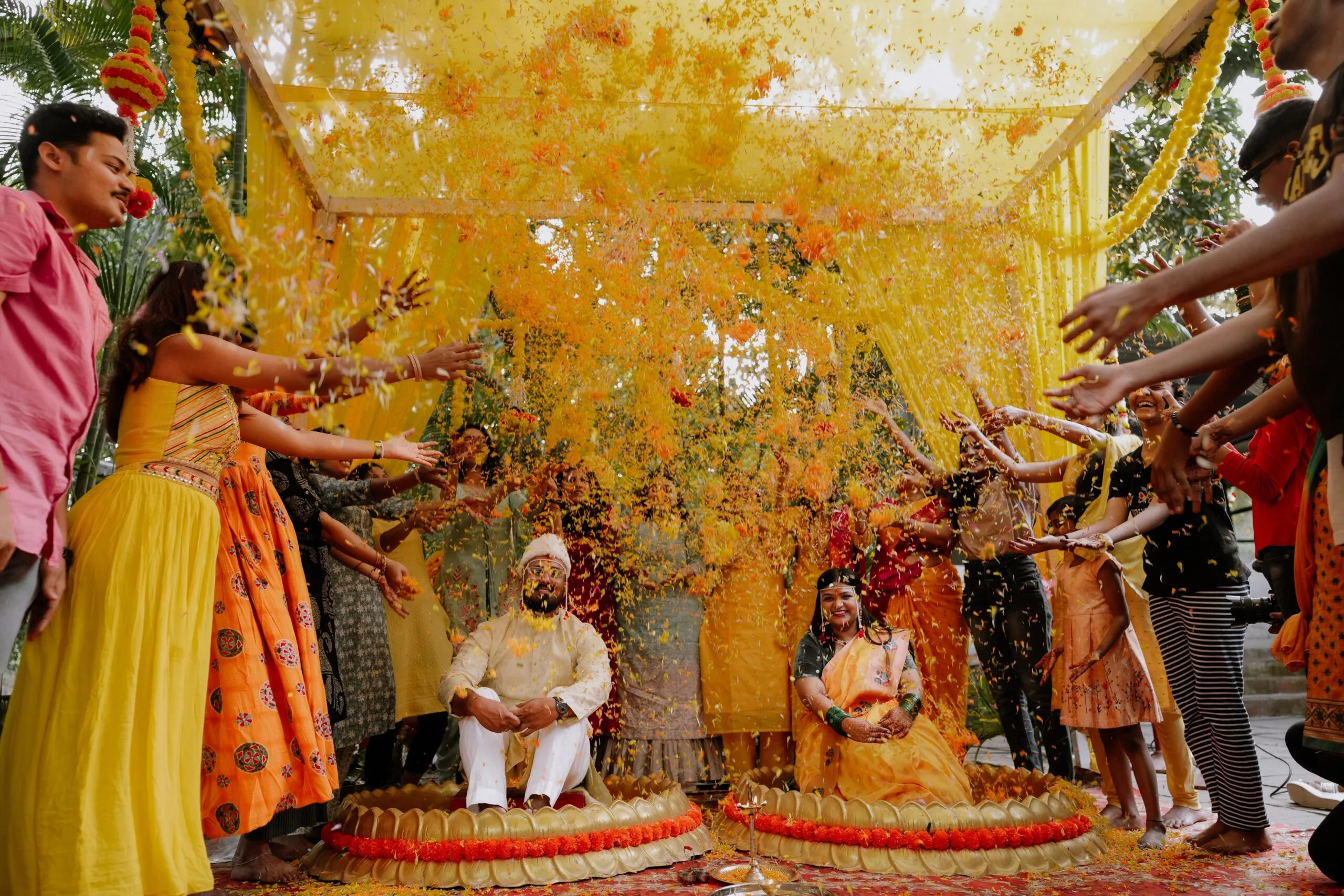Flowers showered during Haldi wedding Photography