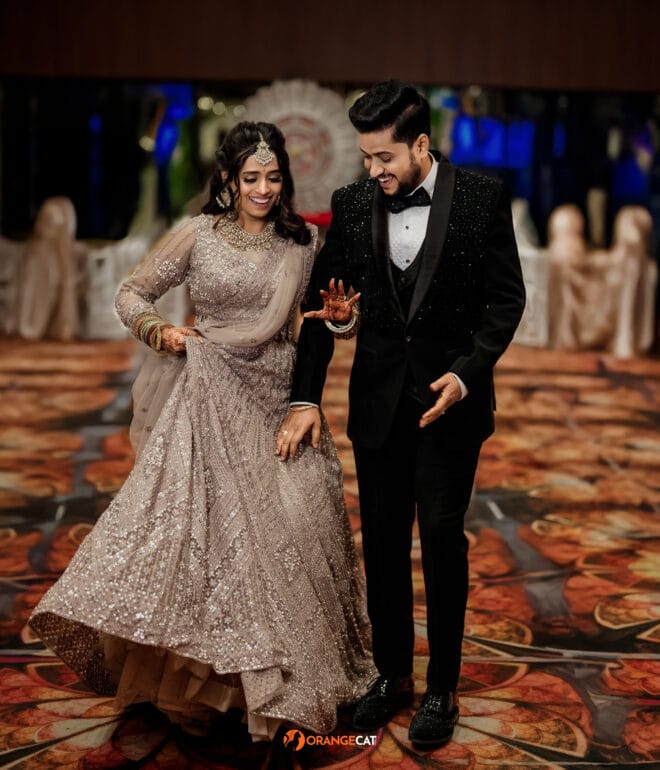 Bride and groom walking down the aisle during their wedding reception