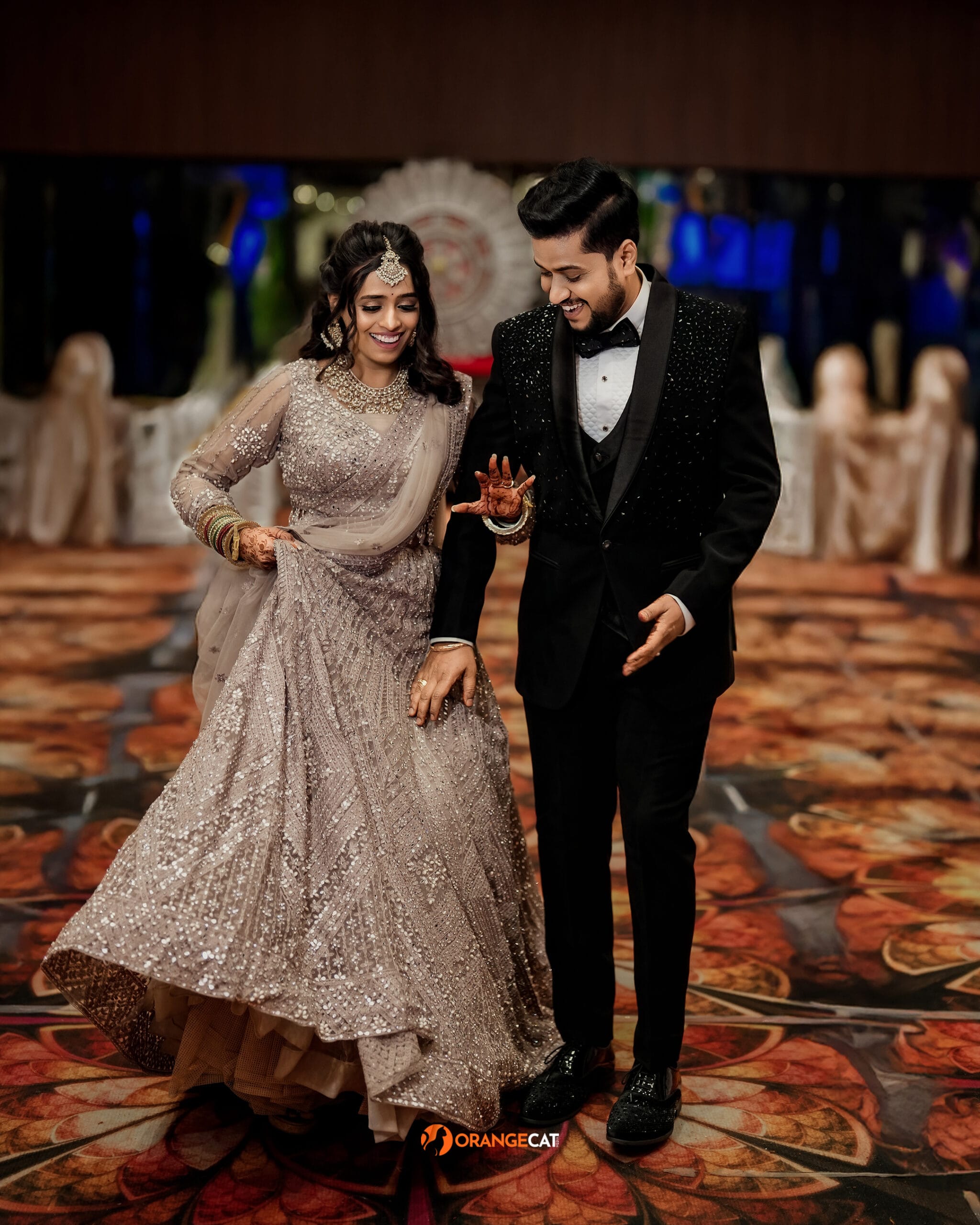 Bride and groom walking down the aisle during their wedding reception